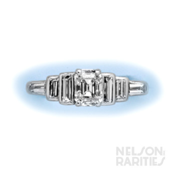 0.72 Carats Emerald-Cut Diamond (GIA F/VVS1),  Baguette Diamond and Platinum Ring