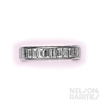 Channel-Set Baguette Diamond and Platinum Eternity Band Consisting of Three Rows of Channel Set Diamonds on all Sides. Size 5