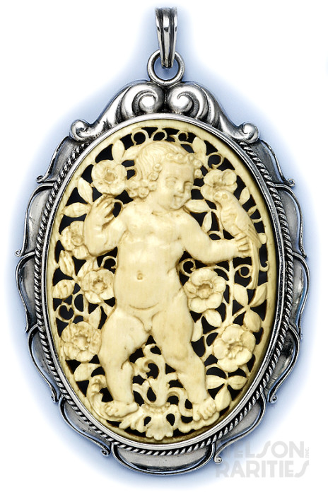 Carved Ivory of a Child in a Garden and Sterling Silver Pendant Necklace