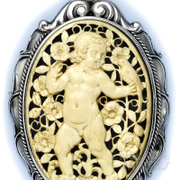 Carved Ivory of a Child in a Garden and Sterling Silver Pendant Necklace